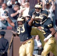 Sam Sword (93), Dhani Jones (55), and  Charles Woodson (2)