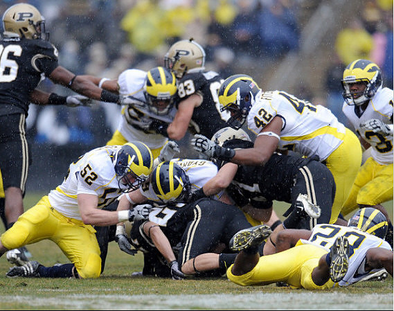 Kevin Leach (52), J.B. Fitzgerald (42), Paul Gyarmati (59), Floyd Simmons (23), and Carvin Johnson (13)