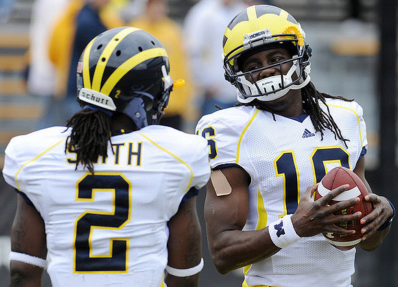 Vincent Smith (2) and Denard Robinson (16)
