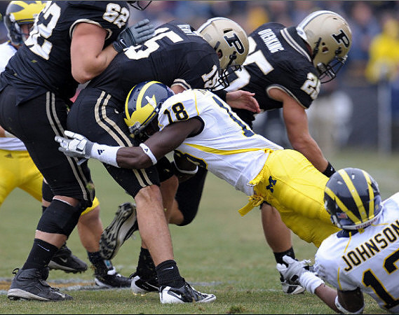 James Rogers (18) and Carvin Johnson (13)