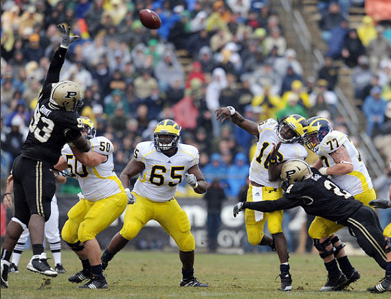 David Molk (50), Patrick Omameh (65), Denard Robinson (16), and Taylor Lewan (77)