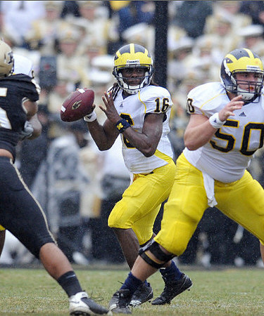Denard Robinson (16) and David Molk (50)