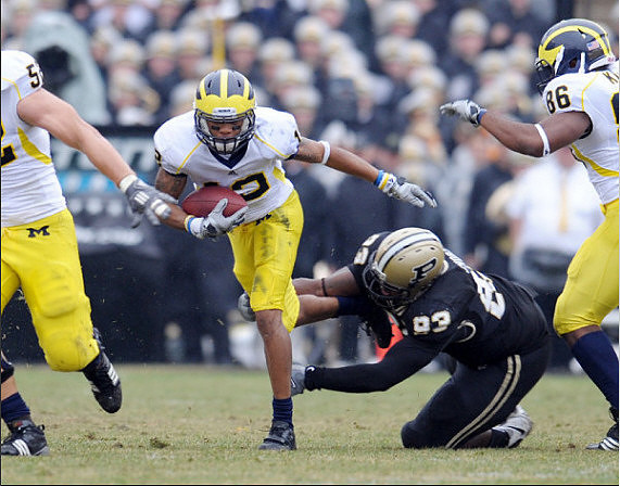 Stephen Schilling (52), Roy Roundtree (12), and Kevin Koger (86)