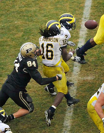 Denard Robinson (16) and Vincent Smith (2)