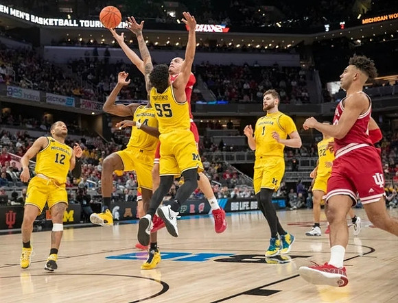 DeVante' Jones (12), Moussa Diabate (14), Eli Brooks (55), Hunter Dickinson (1), and Caleb Houstan (22)