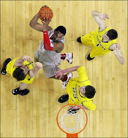 Zack Novak (0), Evan Smotrycz (23), and Stu Douglass (1)