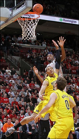 Jordan Morgan (52) and Zack Novak (0)