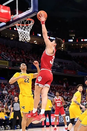 Caleb Houstan (22) and Brandon Johns Jr. (23)