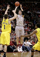 Stu Douglass (1) and Darius Morris (4)