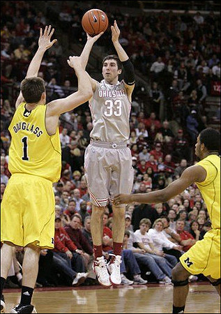 Stu Douglass (1) and Darius Morris (4)