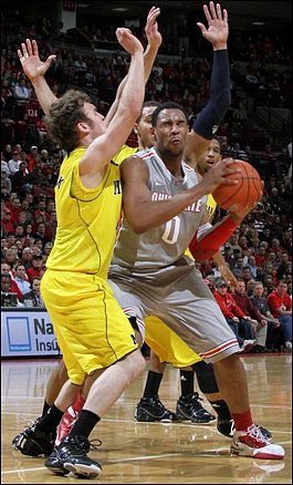 Zack Novak (0), Jordan Morgan (52), and Darius Morris (4)