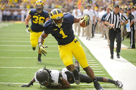 Devin Funchess (1) and Joe Kerridge (36)