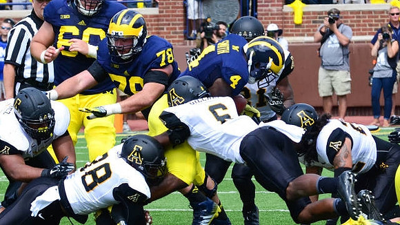Jack Miller (60), Erik Magnuson (78), and De'Veon Smith (4)