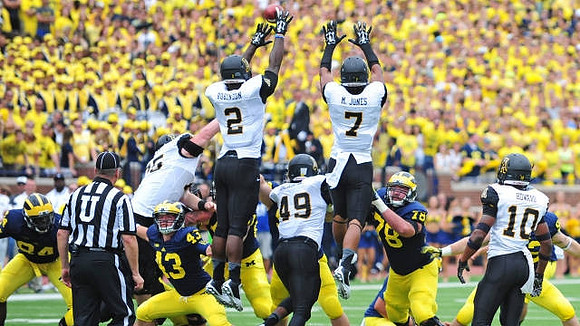 A.J. Williams (84), Scott Sypniewski (43), and Erik Magnuson (78)