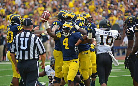 Khalid Hill (80), Ben Braden (71), De'Veon Smith (4), and A.J. Williams (84)
