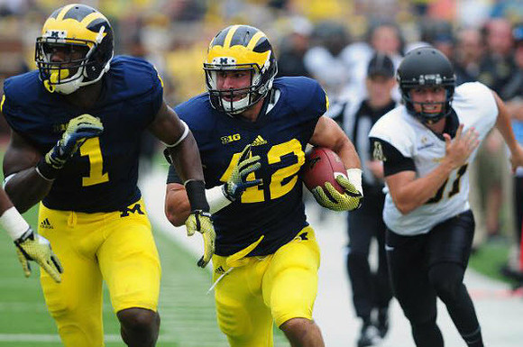 Devin Funchess (1) and Ben Gedeon (42)
