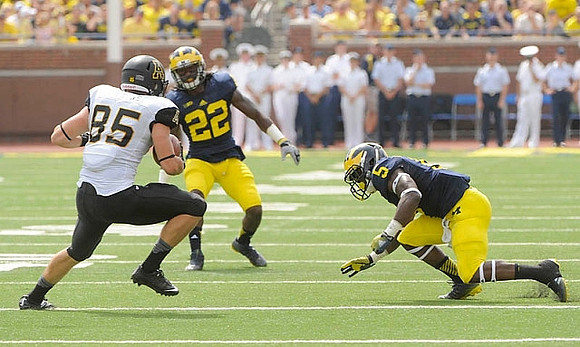 Jarrod Wilson (22) and Jabrill Peppers (5)