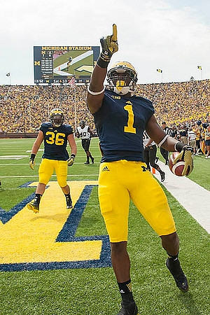 Devin Funchess (1) and Joe Kerridge (36)