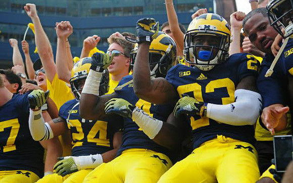 Delonte Hollowell (24), De'Veon Smith (4), and Dennis Norfleet (23)
