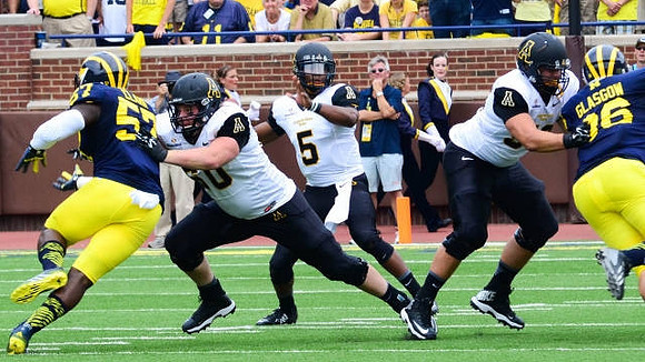 Frank Clark (57) and Ryan Glasgow (96)