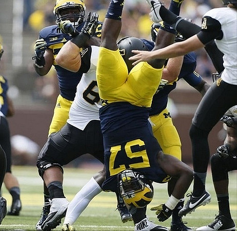 Frank Clark (57) and Royce Jenkins-Stone (52)