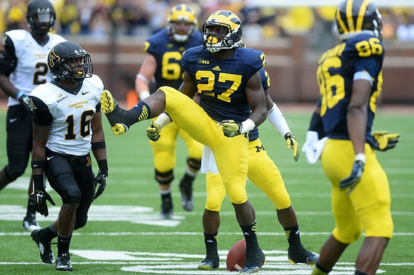 Derrick Green (27), Kyle Kalis (67), and Jehu Chesson (86)