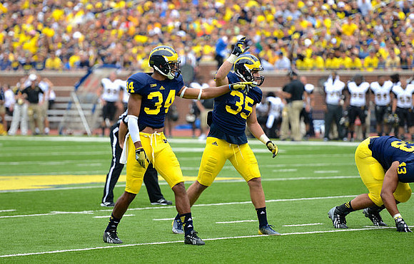 Jeremy Clark (34), Joe Bolden (35), and Chris Wormley (43)