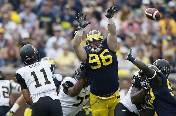 Ryan Glasgow (96) and Mario Ojemudia (53)