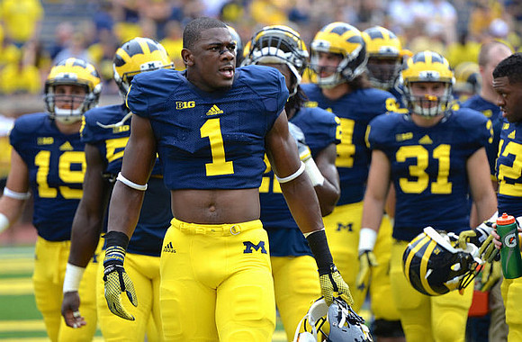 Devin Funchess (1) and Nick Benda (31)