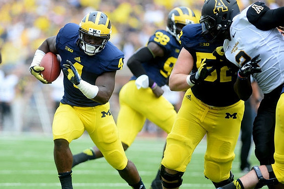 De'Veon Smith (4), Devin Gardner (98), and Mason Cole (52)