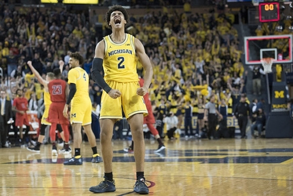 Jordan Poole (2), Isaiah Livers (4), and Moritz Wagner (13)