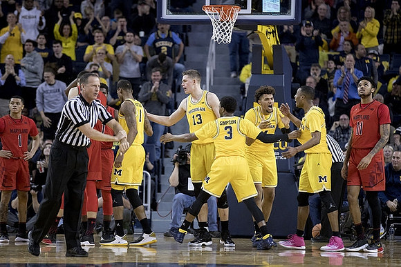 Charles Matthews (1), Moritz Wagner (13), Zavier Simpson (3), Isaiah Livers (4), and Muhammad-Ali Abdur-Rahkman (12)