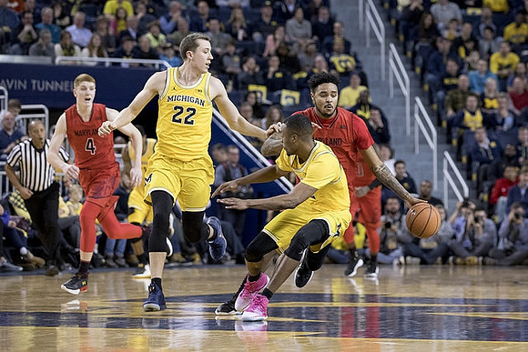 Duncan Robinson (22) and Muhammad-Ali Abdur-Rahkman (12)