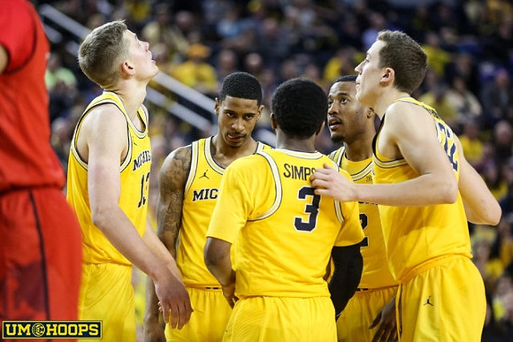 Moritz Wagner (13), Charles Matthews (1), Zavier Simpson (3), Muhammad-Ali Abdur-Rahkman (12), and Duncan Robinson (22)
