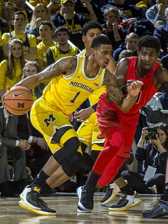 Charles Matthews (1) and Eli Brooks (55)