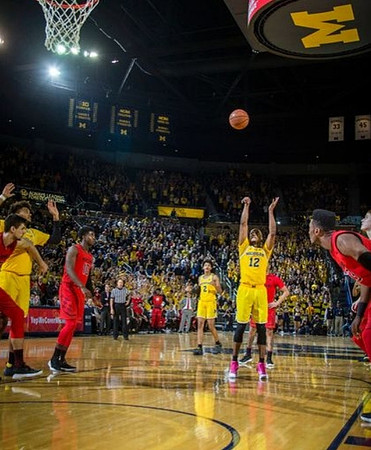 Muhammad-Ali Abdur-Rahkman (12), Isaiah Livers (4), and Jordan Poole (2)