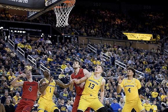 Charles Matthews (1), Moritz Wagner (13), and Isaiah Livers (4)