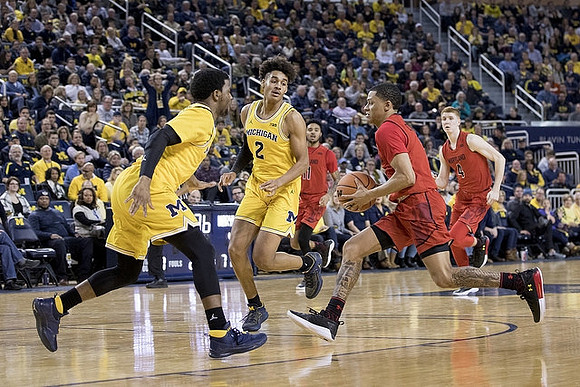 Zavier Simpson (3) and Jordan Poole (2)