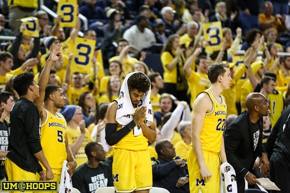 Eli Brooks (55), Jaaron Simmons (5), Jordan Poole (2), and Duncan Robinson (22)