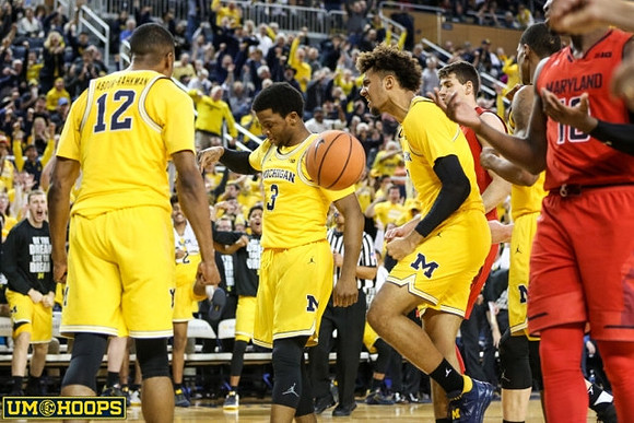 Muhammad-Ali Abdur-Rahkman (12), Zavier Simpson (3), Isaiah Livers (4), and Charles Matthews (1)