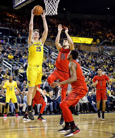 Muhammad-Ali Abdur-Rahkman (12) and Jon Teske (15)