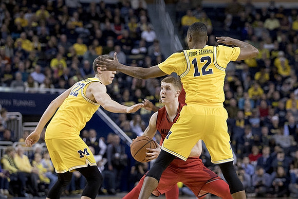 Duncan Robinson (22) and Muhammad-Ali Abdur-Rahkman (12)