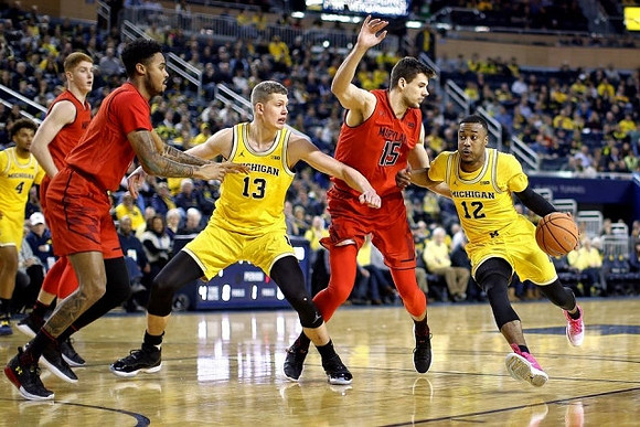 Isaiah Livers (4), Moritz Wagner (13), and Muhammad-Ali Abdur-Rahkman (12)