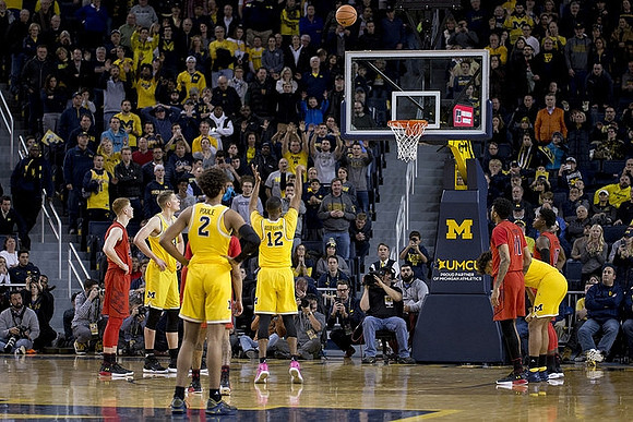 Moritz Wagner (13), Jordan Poole (2), Muhammad-Ali Abdur-Rahkman (12), and Isaiah Livers (4)