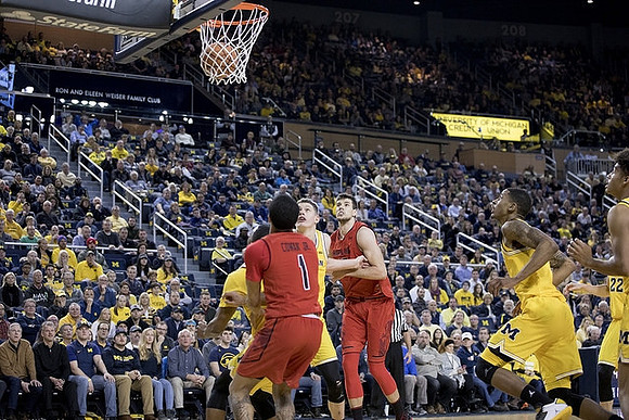 Moritz Wagner (13), Charles Matthews (1), and Jordan Poole (2)
