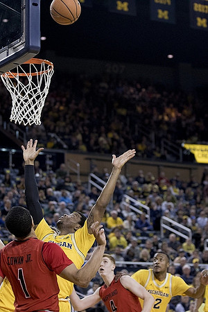 Zavier Simpson (3) and Muhammad-Ali Abdur-Rahkman (12)