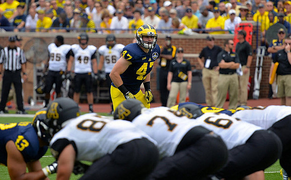 Chris Wormley (43) and Jake Ryan (47)
