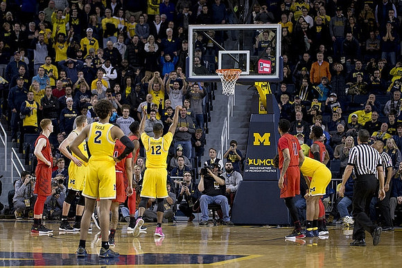 Moritz Wagner (13), Jordan Poole (2), Muhammad-Ali Abdur-Rahkman (12), and Isaiah Livers (4)