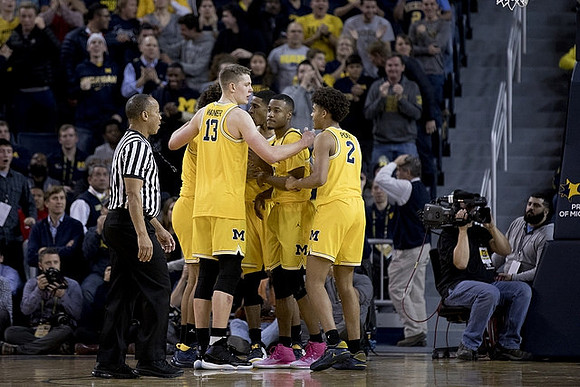 Isaiah Livers (4), Moritz Wagner (13), Charles Matthews (1), Muhammad-Ali Abdur-Rahkman (12), and Jordan Poole (2)