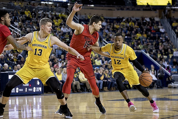 Moritz Wagner (13) and Muhammad-Ali Abdur-Rahkman (12)